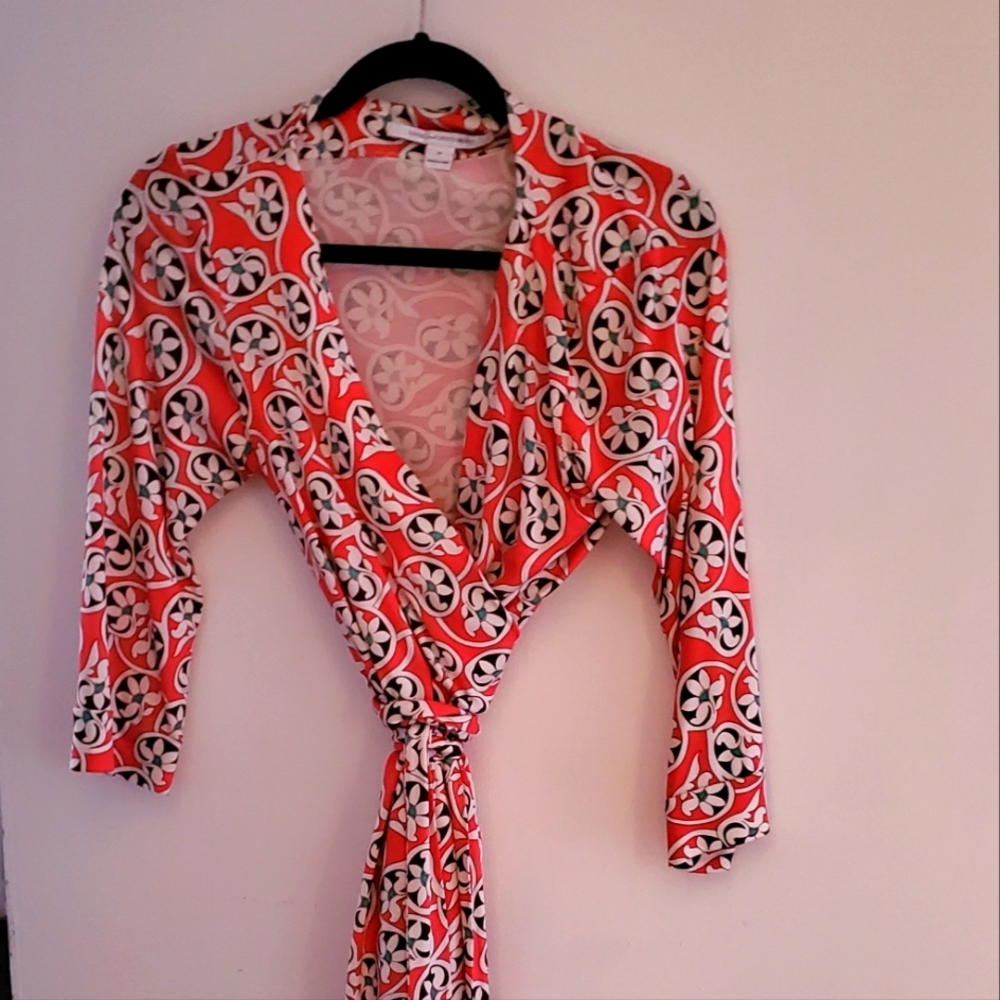 Diane Von Furstenberg- DVF Orange print size 14 silk wrap dress.